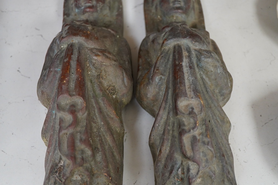 A pair of Egyptian style bronze figural mounts, 50cm